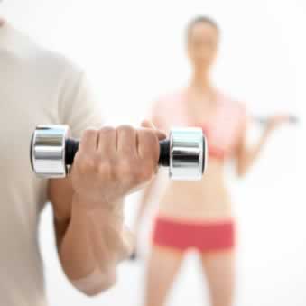 man holding dumbell