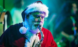 dougholsworth decorative image of dougholsworth , New PSC band director has plenty of recruiting connections – and he rocks as Santa 2021-09-08 10:49:12