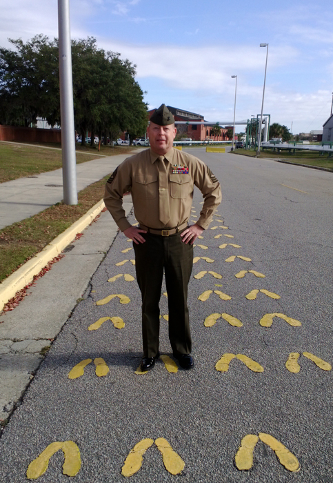 decorative image of 1STSGT-HELFERT-ON-FOOTPRINTS-1 , Retired Marine is a Veterans Upward Bound success story – and now a Veterans Upward Bound recruiter 2022-06-08 13:26:16