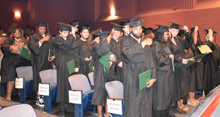 decorative image of Adult-Ed-graduation-turning-the-tassel-2 , PSC Adult High graduates ready for next chapter – for some that means college 2022-12-08 11:34:32