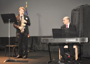 decorative image of Ezra-Baker-accompanied-by-Dr.-Benjamin-Rollings-performs-at-luncheon-scaled , 16 Pensacola State students receive $22,000 in Cantonment Rotary Club scholarships 2023-06-28 11:04:23