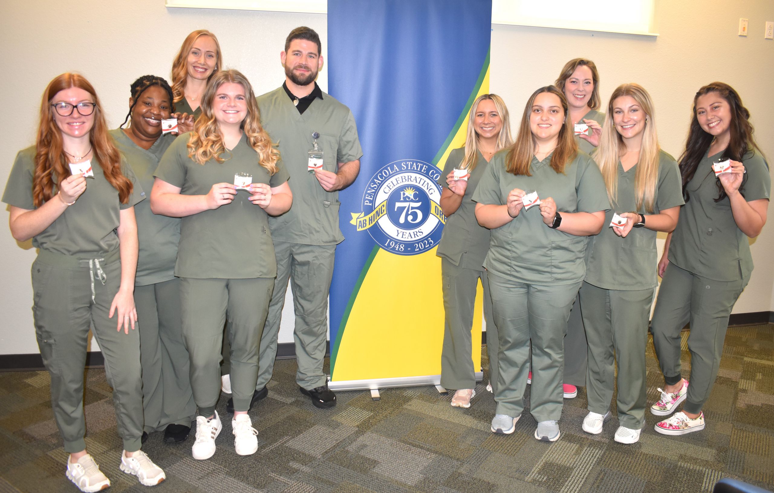 decorative image of Physical-Therapist-Assistant-grads-with-pins-scaled , Allied Health Pinnings 2024-05-16 09:58:59