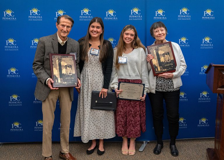 Ami-Lee Wilder’s parents, with students Andria Glaze and Kylie Moore, recipients of the new Ami-Lee Wilder Pirates CARE Endowed Scholarship.