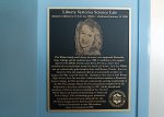 The commemorative plaque for the Liberty Sertoma Science Lab in Memory of Ami-Lee Wilder hangs outside adjoining labs at the PSC South Santa Rosa Center in Gulf Breeze, Tuesday, Jan.13, 2026.