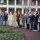 PSC staff gather for the Pledge of Allegiance at the flagpole on the Pensacola campus.