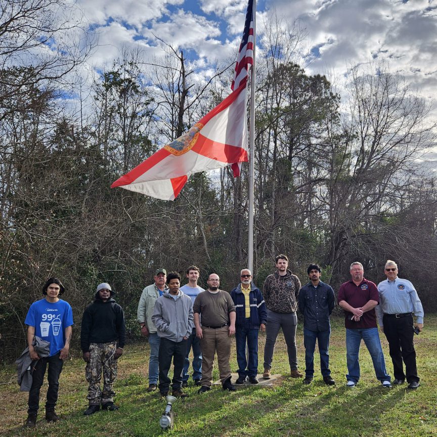 Decorative image of flag raising ceremony at Century Center Campus.